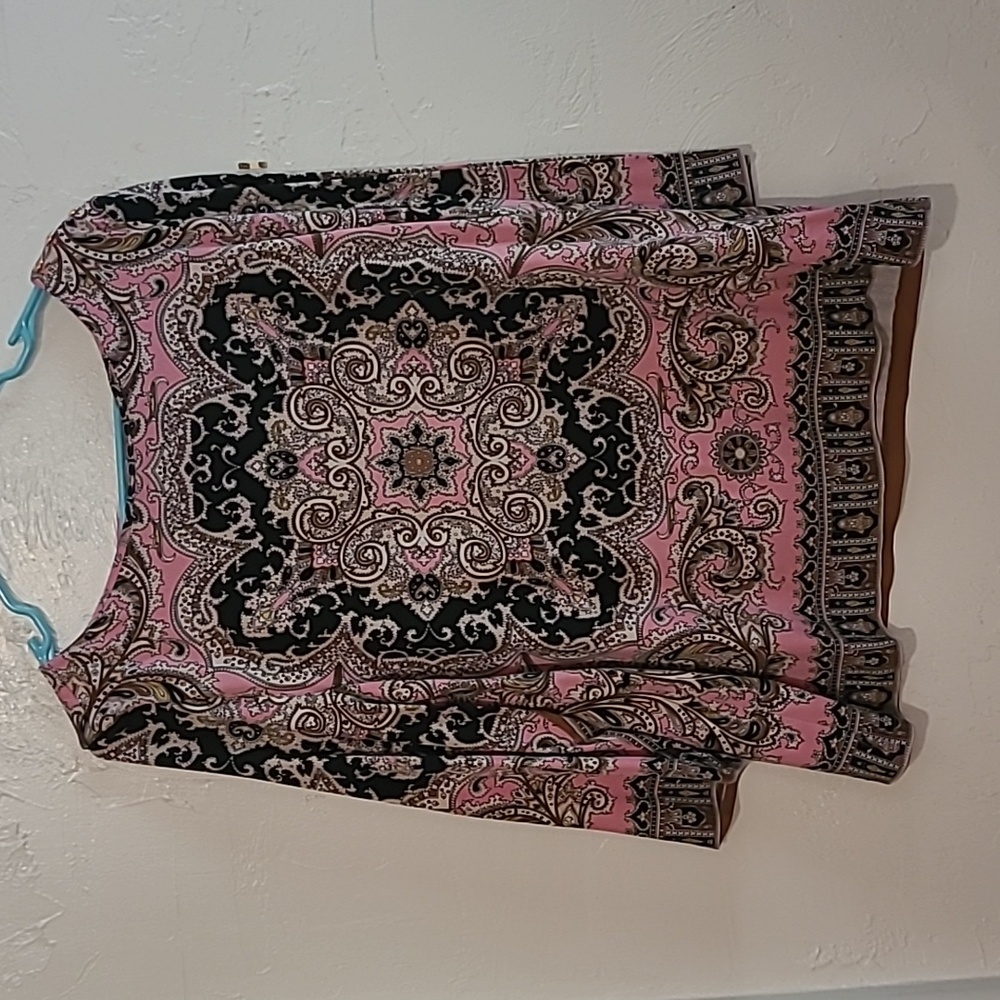 A pink paisley blouse